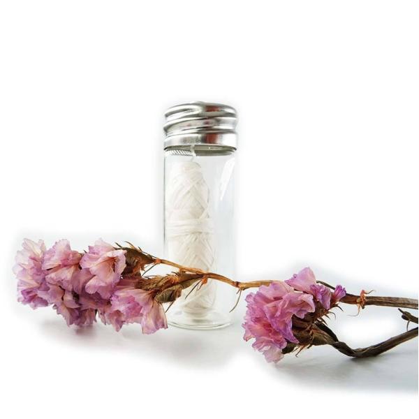 Oral care biodegradable silk dental floss in glass bottle container